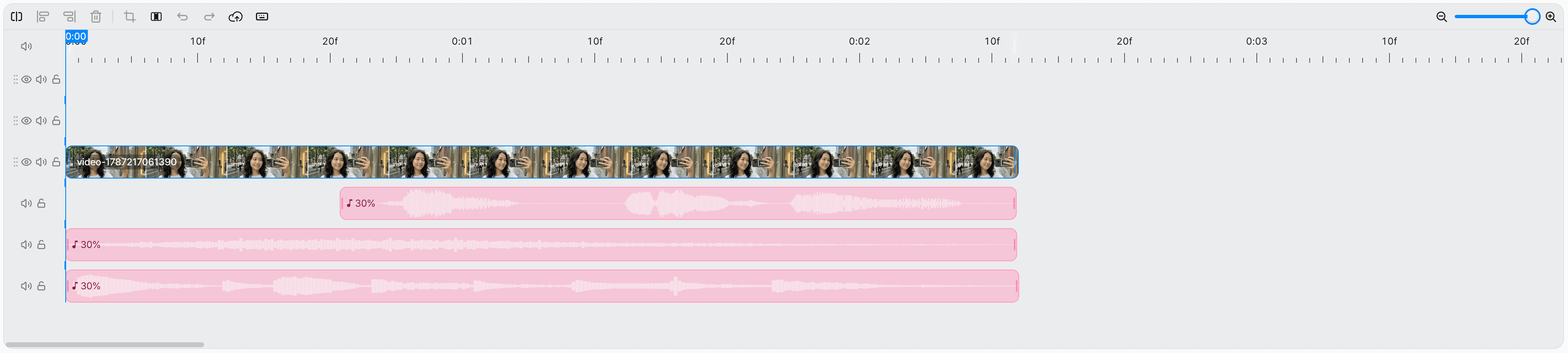 A timeline with three audio tracks below a single video clip track, each showing a waveform and a volume of 30%